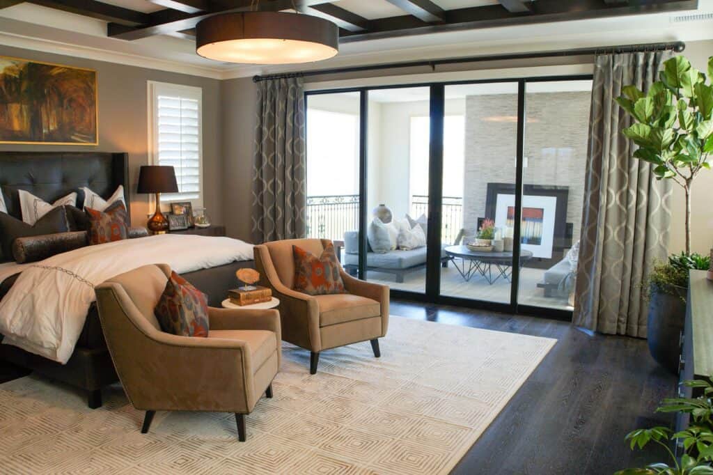 Elegant bedroom featuring luxury sliding door balcony access.