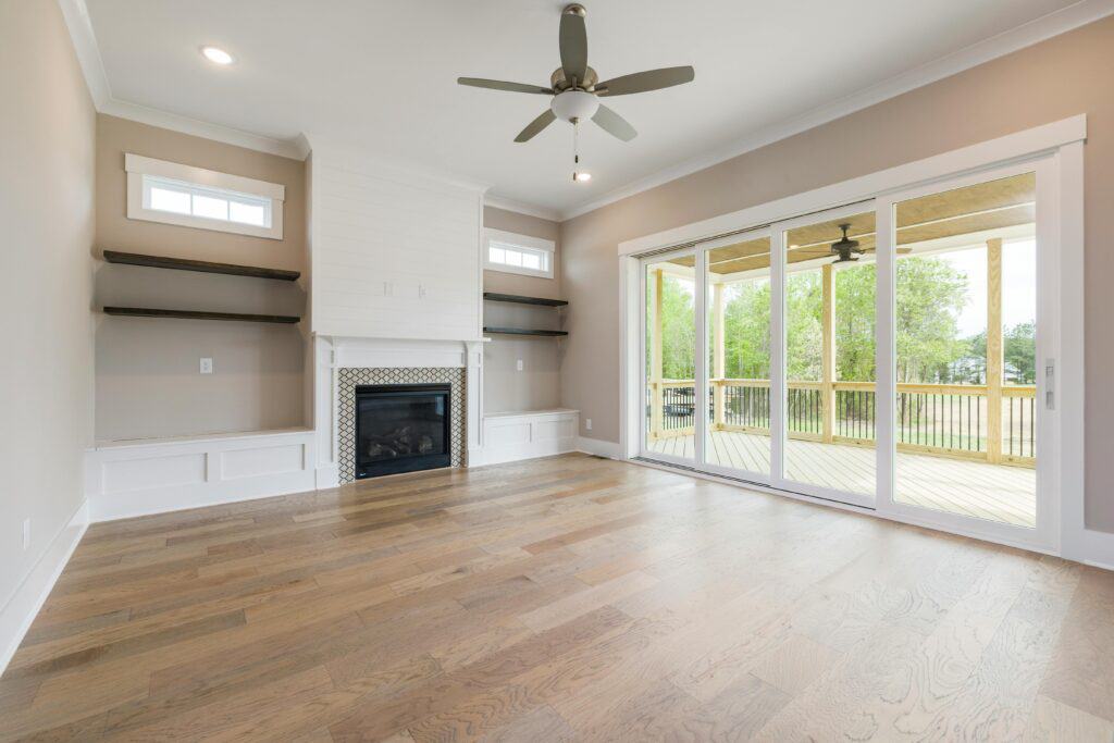 Spacious living room with through glass sliding doors. Sliding Door Repair Gallery