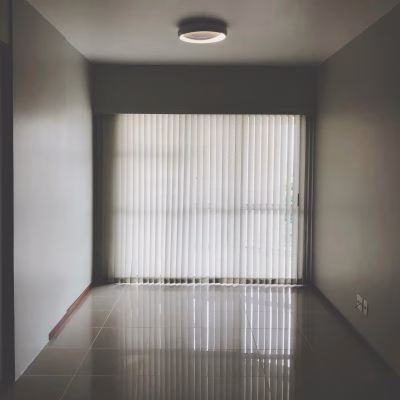 pexels-photo-803908-803908 Spacious empty room with modern design featuring large window blinds and tiled floor.